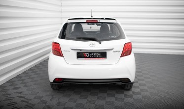 Тюнінговий кап спойлер на кришку багажника Toyota Yaris Mk3 рестайл фото