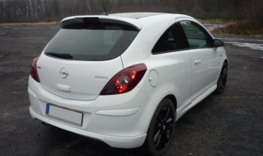 Тюнинговая накладка заднего бампера Opel Corsa D стиль OPC фото