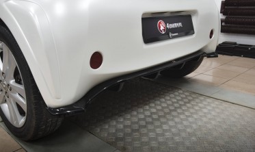Тюнинговый нижний диффузор (накладка) на задний бампер Toyota IQ фото
