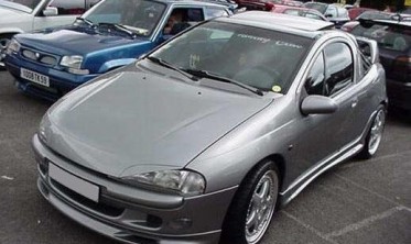 Накладки на фары Opel Tigra широкие фото