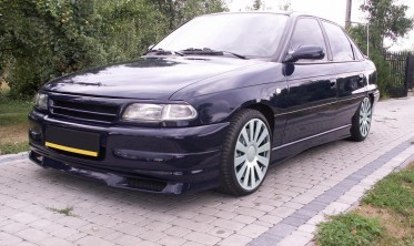 Бампер передній тюнінговий Opel Astra F варіант 1 фото