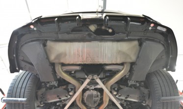 Тюнинговый диффузор (накладка) на задний бампер BMW XM G09 фото