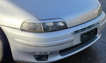Накладки на передние фары Fiat Punto I фото