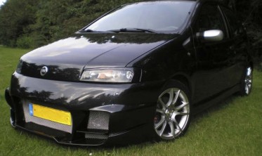 Накладки на передні фари Fiat Punto II із загином фото