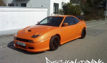 Тюнинговые накладки на передние фары Fiat Coupe фото