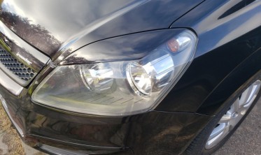 Накладки на передние фары Opel Zafira B (широкие) фото