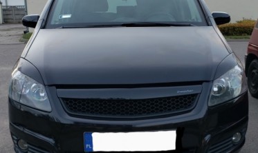 Накладки на передние фары Opel Zafira B (широкие) фото