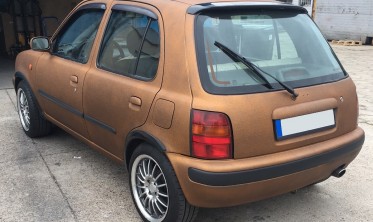 Спойлер кришки багажника Nissan Micra K11 фото