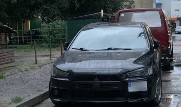 Бампер передний Mitsubishi Lancer X в стиле EVO фото