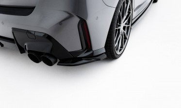 Бокові накладки (дифузори) на задній бампер BMW M135i F70 фото