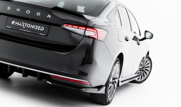 Бокові тюнінг елерони заднього бампера Skoda Superb Mk4 вар. 2 фото