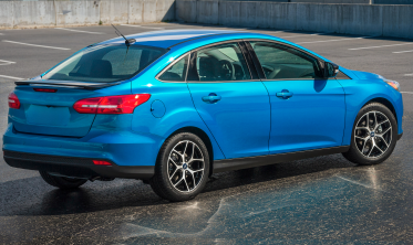 Спойлер на кришку багажника Ford Focus MK3 sedan фото