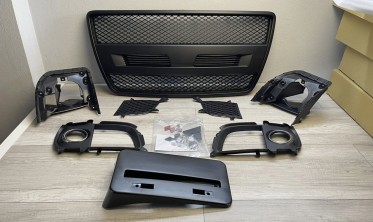 Бампер передний Mitsubishi Lancer X в стиле EVO фото