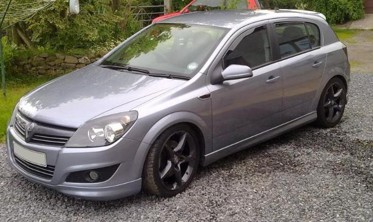 Накладка переднего бампера Opel Astra H рестайл в стиле OPC фото