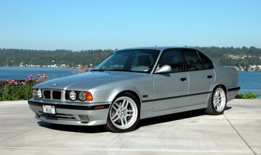 Накладки на пороги BMW E34 у стилі М5 фото