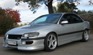 Накладка переднього бампера Opel Omega B дорестайл фото