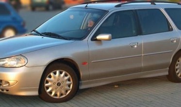 Накладки на пороги Ford Mondeo I/II стиль ST фото