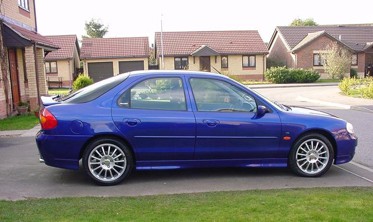 Накладки на пороги Ford Mondeo I/II стиль ST фото