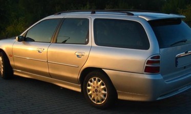 Накладки на пороги Ford Mondeo I/II стиль ST фото