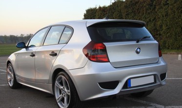 Спойлер крышки багажника BMW E81, E87 стиль Aero фото