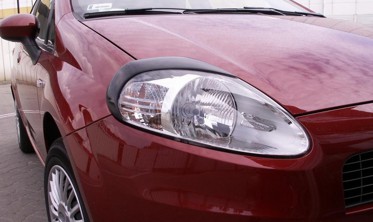 Накладки на передние фары Fiat Grande Punto фото