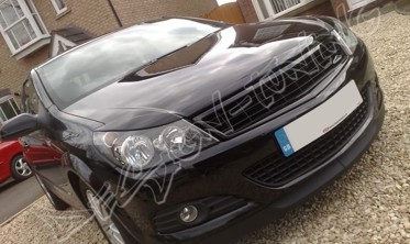 Накладки на фари Opel Astra H (модель 1) фото