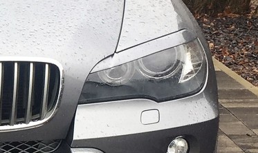 Накладки передні фари BMW X5 E70 широкі фото