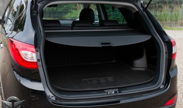 шторка-полиця багажника Hyundai IX35 чорна фото