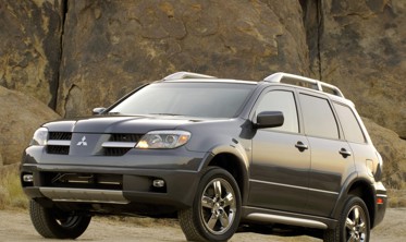 шторка-полка багажника Mitsubishi Outlander, черная фото