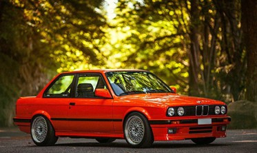 Накладка на передний бампер BMW E30 IS стиль фото
