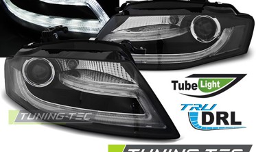 Передние фары AUDI A4 B8 дорестайл черные с линзами и функцией ДХО фото
