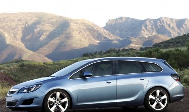 Захисна накладка за задній бампер Opel Astra J Sports Tourer фото