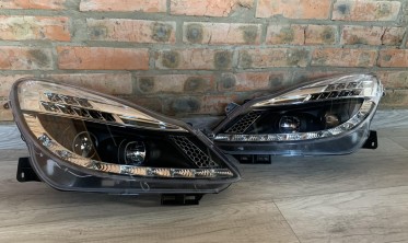 Фары передние Opel Corsa D дорестайл черные c LED поворотами фото