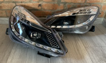 Фары передние Opel Corsa D дорестайл черные c LED поворотами фото