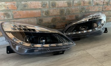 Фары передние Opel Corsa D дорестайл черные c LED поворотами фото
