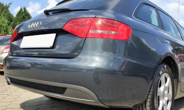 Диффузор заднего бампера Audi A4 B8 в стиле S-line с одним вырезом  фото
