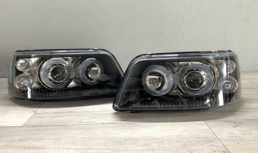 Тюнинговые фары передние VW T5 дорестайл с ангельскими глазками  фото
