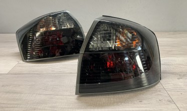 Тюнінгові задні ліхтарі Audi A4 B6 тоновані фото