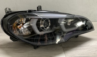 Тюнинговые фары передние BMW X5 E70 с 3D кольцами и ДХО фото