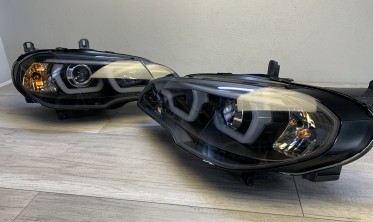 Тюнинговые фары передние BMW X5 E70 с 3D кольцами и ДХО фото