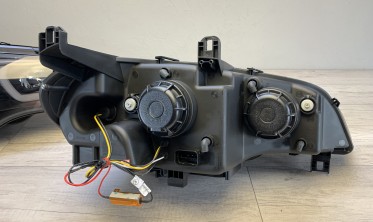 Тюнинговые фары передние BMW X5 E70 с 3D кольцами и ДХО фото