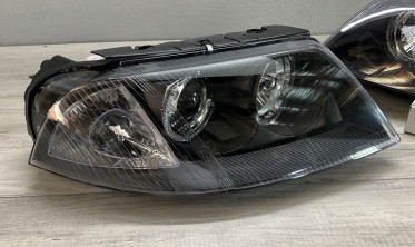 Тюнинговые фары VW Passat B5+ с кольцами Angel Eyes black фото