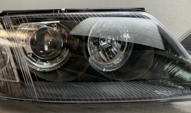Тюнинговые фары VW Passat B5+ с кольцами Angel Eyes black фото