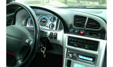 Тюнинговые накладки в щиток приборов Mazda 323F BA фото