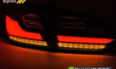 Тюнинговые задние фонари (стопы) Ford Fiesta MK8 красно-белые фото