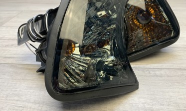 Повороти передні BMW E34 тоновані з габаритами фото