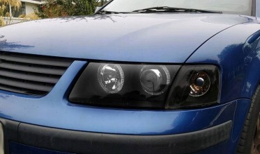 Передние фары VW Passat B5 фирмы Депо с кольцами черные фото