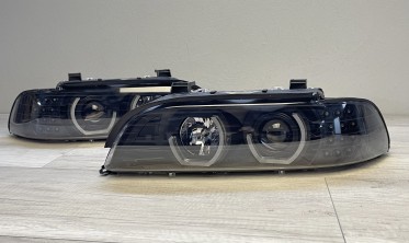 Фары передние BMW E39 черные c 3D ангельскими глазками фото