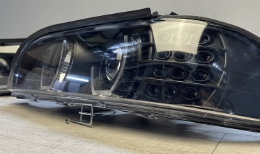 Фары передние BMW E39 черные c 3D ангельскими глазками фото