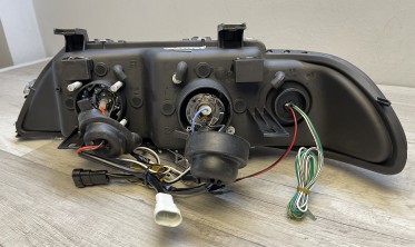 Фары передние BMW E39 черные c 3D ангельскими глазками фото